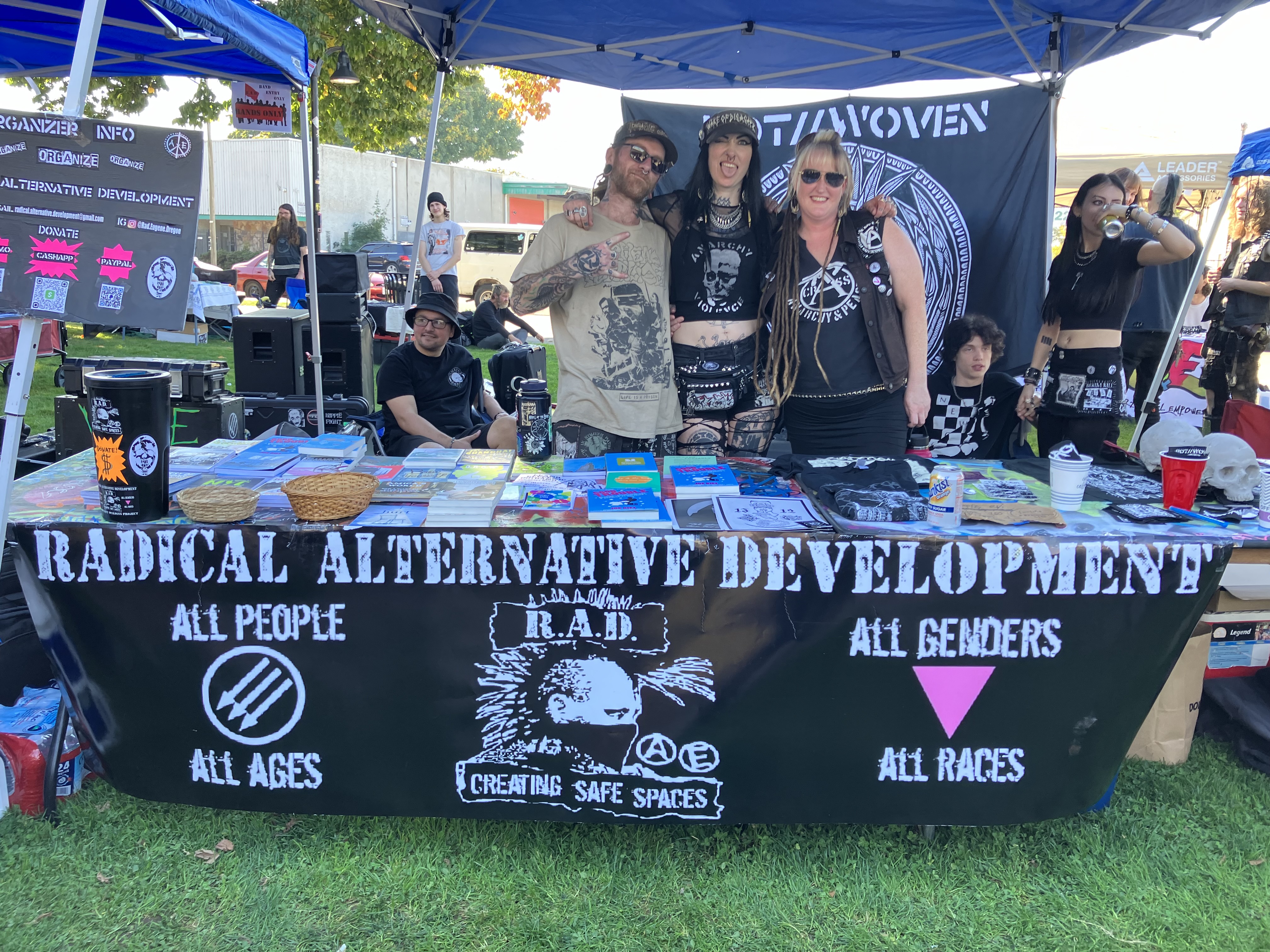 From left to right: Tim, BriJit, and Amy tabling at the event